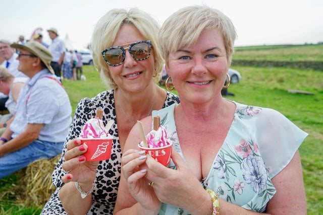 Susan Bowcock and Adele Bath enjoying an ice cream at Longnor Races. Photo Brian Eyre