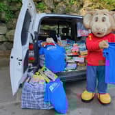 Gulliver’s mascot Gully Mouse with Toys collected for KidsOut charity at Gulliver’s Kingdom.