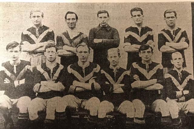The New Mills team pictured just a couple of weeks after moving to the Church Lane ground in 1921.