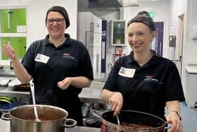 Marie Carmon and Sophie Jepson serve up a community meal at YMCA Derbyshire
