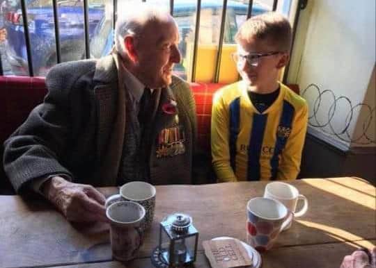 Derek Eley with a young Chapel Town FC fan