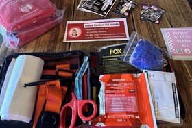 The Bleed Control Kits are stocked with a range of items designed to help control a catastrophic bleed, including a trauma dressing, gauze dressing, chest seal, tourniquet, gloves, and scissors.