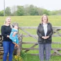 From left, Foolow Wildwood committee member Katie Edwards and baby Lottie, Sarah Dines MP, and Councillor Alasdair Sutton.