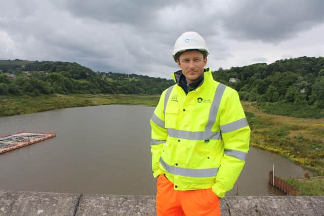 Tom Greenwood from the Canal and River Trust pictured at Toddbrook Reservoir in Whaley Bridge where construction work has just started.