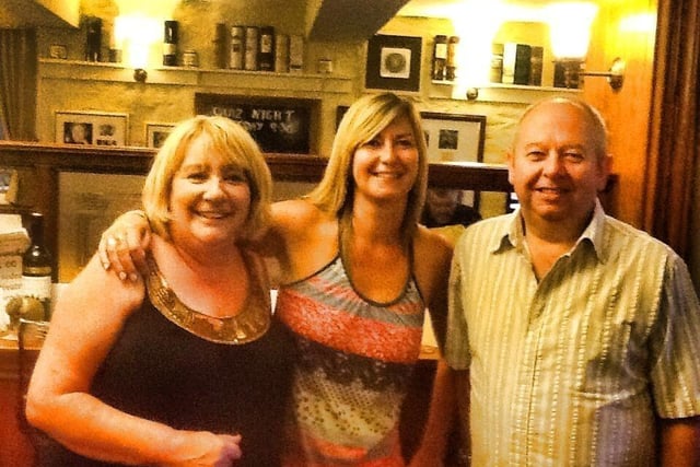Chairman of High Peak Women's Aid Linda Rundle, Kaye Phillips, and landlord Bob Skupham at the fundraiser at the Wheatsheaf, in Old Glossop in 2013