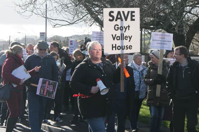 Relatives of Goyt Valley House residents and supportive members of the public march against its closure