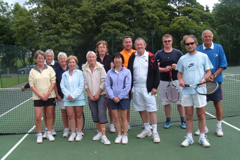 Members of Buxton Tennis Club gather during the summer of 2011.