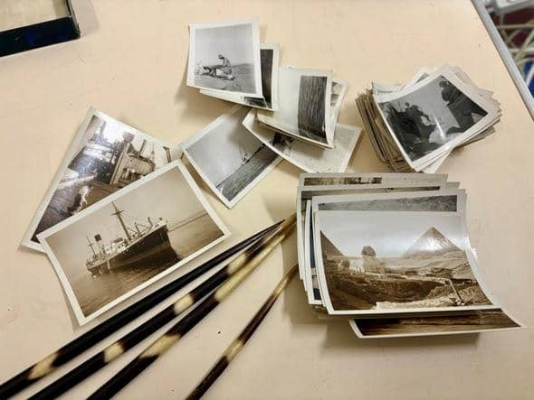 J.W.J Jackson’s personal photographs of expeditions to Egypt in the same box as porcupine spines. Photo Buxton Museum