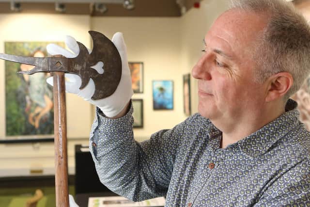 Bret with an axe made by the Dakota Indians