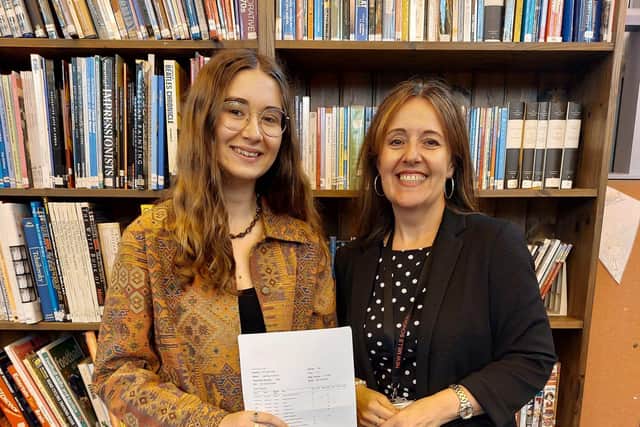 Mrs Heather Watts, headteacher of New Mills School celebrates with Isla Hutchins who received her excellent exam results today. Pic submitted