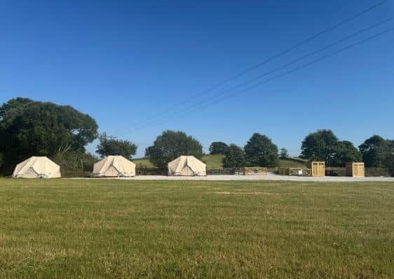 Mr Shore's application seeking consent for change of use of land from temporary campsite to permanent tented campsite includes the retention of three bell tents and two toilet and shower buildings.