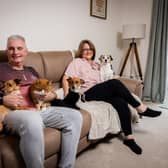 Martin and Laura Penhallow with the family pets in their stunning new home in Whaley Bridge.