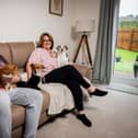 Martin and Laura Penhallow with the family pets in their stunning new home in Whaley Bridge.