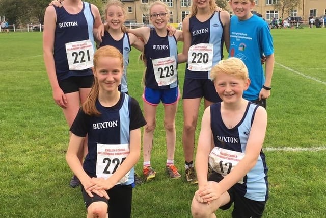 Members of Buxton AC pose during an event.