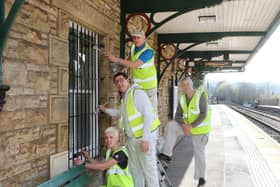 Whaley 4Wards volunteers Jane Draper, Bill Carr, Ashley McKiernan and Ian Kidd painting at the station