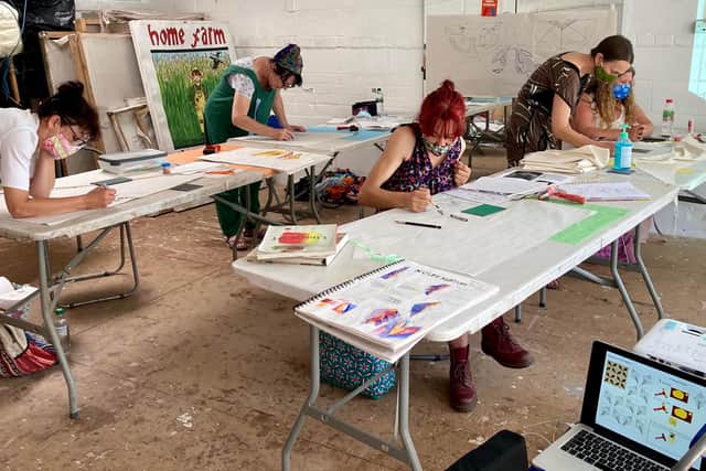 Artists hard at work getting ready for the New Mills Art Trail 2021