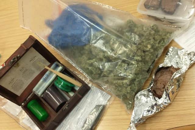 Police seized cannabis, a knife and other drugs paraphernalia from the pair.