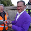 FoBS Vice Chairman, Brian Jones receiving congratulations and their 2022 CRN Award trophy from Michael Portillo, broadcaster and TV presenter (left to right). Photo taken by Dave Carlisle.