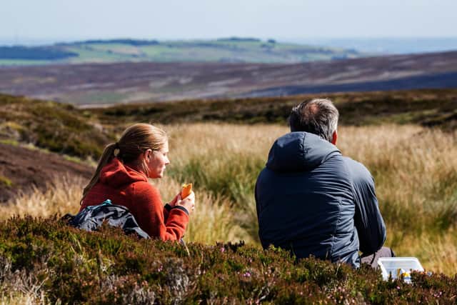 The Moors for the Future Partnership works to raise ecological awareness and help people engage with landscape conservation. (Photo: Graham Dunn)