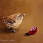 Richard Whittlestone's painting of a wren with a wine gum.