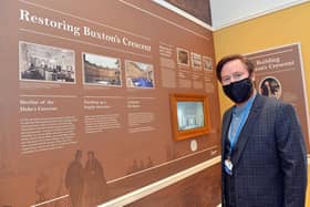 Scott Russell, the Trust's education development manager, at a timeline of the Crescent's history