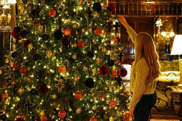 Hundreds of baubles decorate the Christmas trees throughout Chatsworth House.