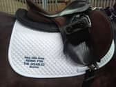 High Peak shoppers have helped a Buxton-based charity net £1,500 to help it boost the comfort and safety of disabled riders of all ages.