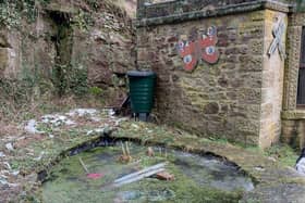 Vandals have thrown items into the pond, tipped over the sundial and a made general mess of the garden area and its facilities.