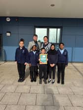 Bluecoat Primary Headteacher Ben Jackson(L) and Safeguarding Lead Kathryn Brown (R) with several young carers.