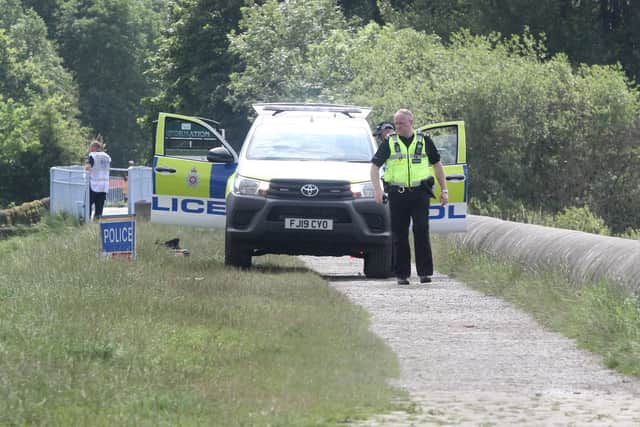 Emergency incident at Toddbrook Reservoir, Police on Dam wall