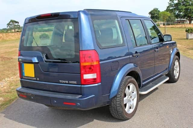 A blue 05 plate Land Rover Discovery (similar to the one pictured), was taken