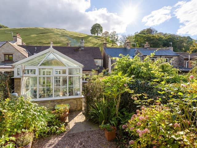 Even through this picture in the garden you can see part of the stunning scenery surrounding Castleton.