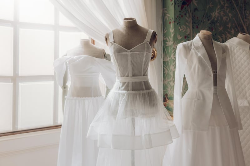Pure white dresses displayed in all their glory.
