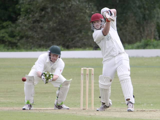 Scott Mackenzie puts up some resistance against Tintwistle.