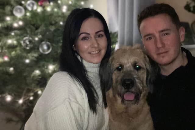 Distraught Emmie and partner Thomas Crelling face  a whopping £10,000 bill for surgery to save pooch Basil's life