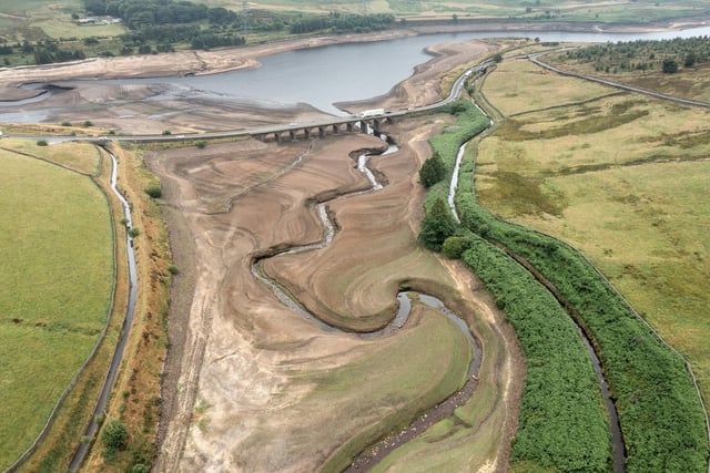 In this aerial view the bed of the Woodhead reservoir can be seen as summer water levels become reduced