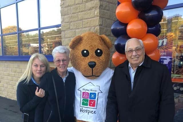 Vickie Poulson and her family, mum Lynne and dad Bill with Blythe Bear (Vickie’s sister, Aby, is in the costume!) at the opening of Whaley Bridge’s B&M store in 2018.