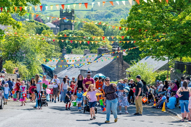 The village of Hayfield was dressed up ready to welcome back the May Queen for the first time since before the pandemic. Picture Anthony McKeown