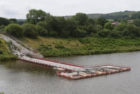 Toddbrook Reservoir, the much reduced lake will keep the emergency pumps in place until the project is complete. Pic Jason Chadwick