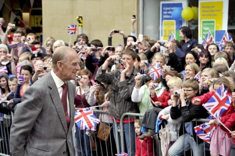 The Duke of Edinburgh heads towards the crowds in Alnwick town centre for a chat and a smile.
