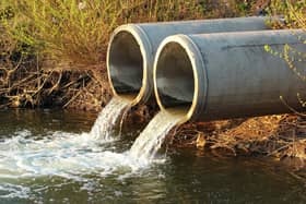 Discharge of sewage into a river. (Getty Images/iStockphoto)