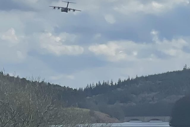 ​A super shot from Jude Bridgestock shows an Atlas plane flying over Ladybower Reservoir.
