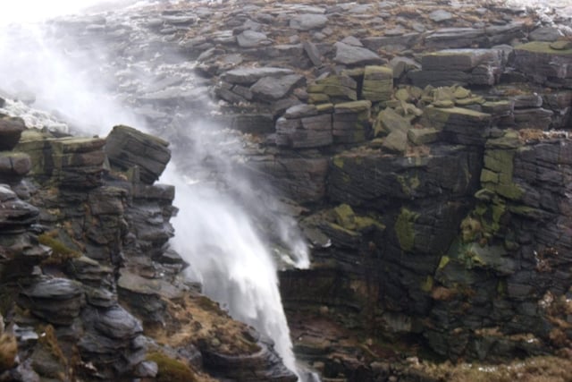 It might take a few hours to reach this spot, but it is well worth the climb for the amazing views of this waterfall on the edge of Kinder Scout.