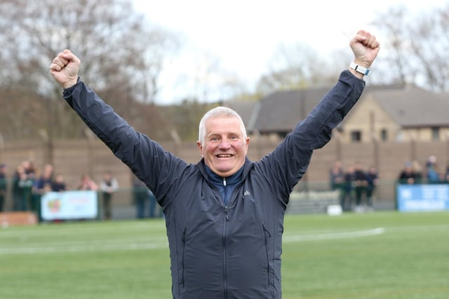 Buxton legend Dave Bainbridge celebrates on the pitch