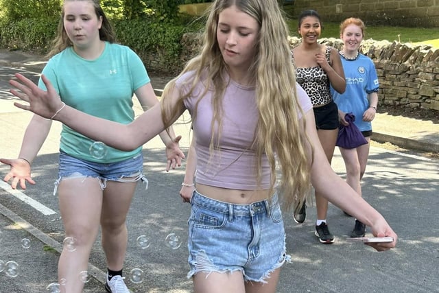 Bubbly fun for these young ladies. Photo by Polly Williams