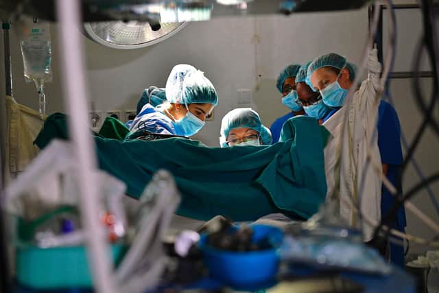 Is the current system subjecting women to investigative surgeries due to non-specialist care? (Photo credit should read CARL DE SOUZA/AFP via Getty Images)
