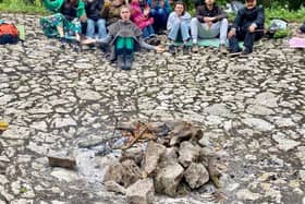 Some of the members after they had cleared a limestone reservoir on their new land at Cressbrook Dale