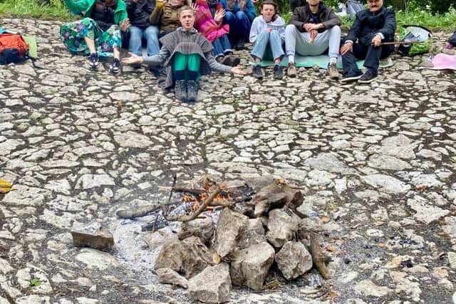 Some of the members after they had cleared a limestone reservoir on their new land at Cressbrook Dale