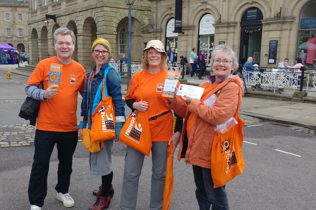 Fringe volunteers giving out flyers at the spring fair. From left to right: Rob Harrison, Maria Carnegie, Pam Mason and Jeanette Hamilton.