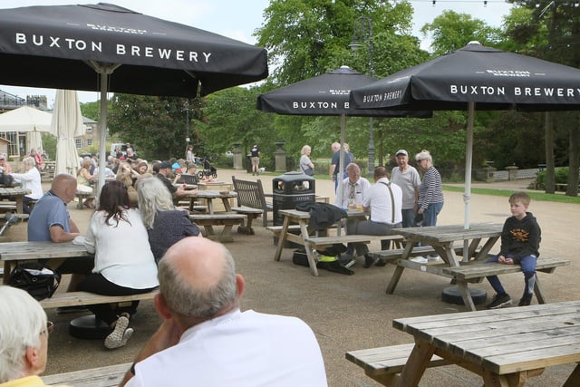Customers enjoyed the welcome shade during a sunny day in Buxton's Pavilion Gardens. Pic Jason Chadwick